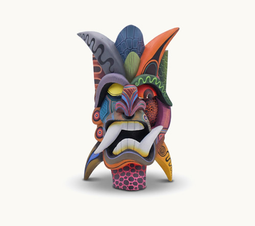 Máscara Boruca indígena de estilo diablito tallada en madera con colores vivos